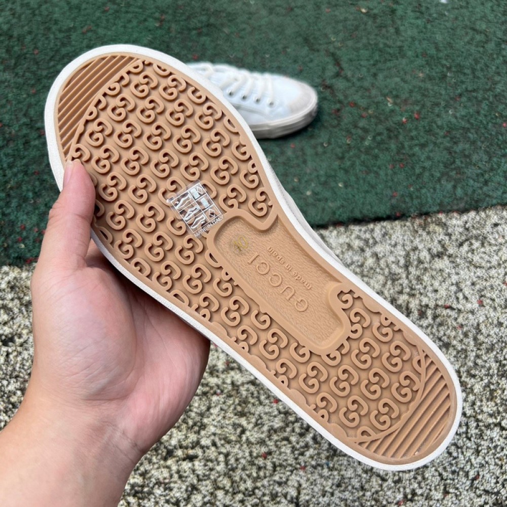 G*u*i1 sneakers