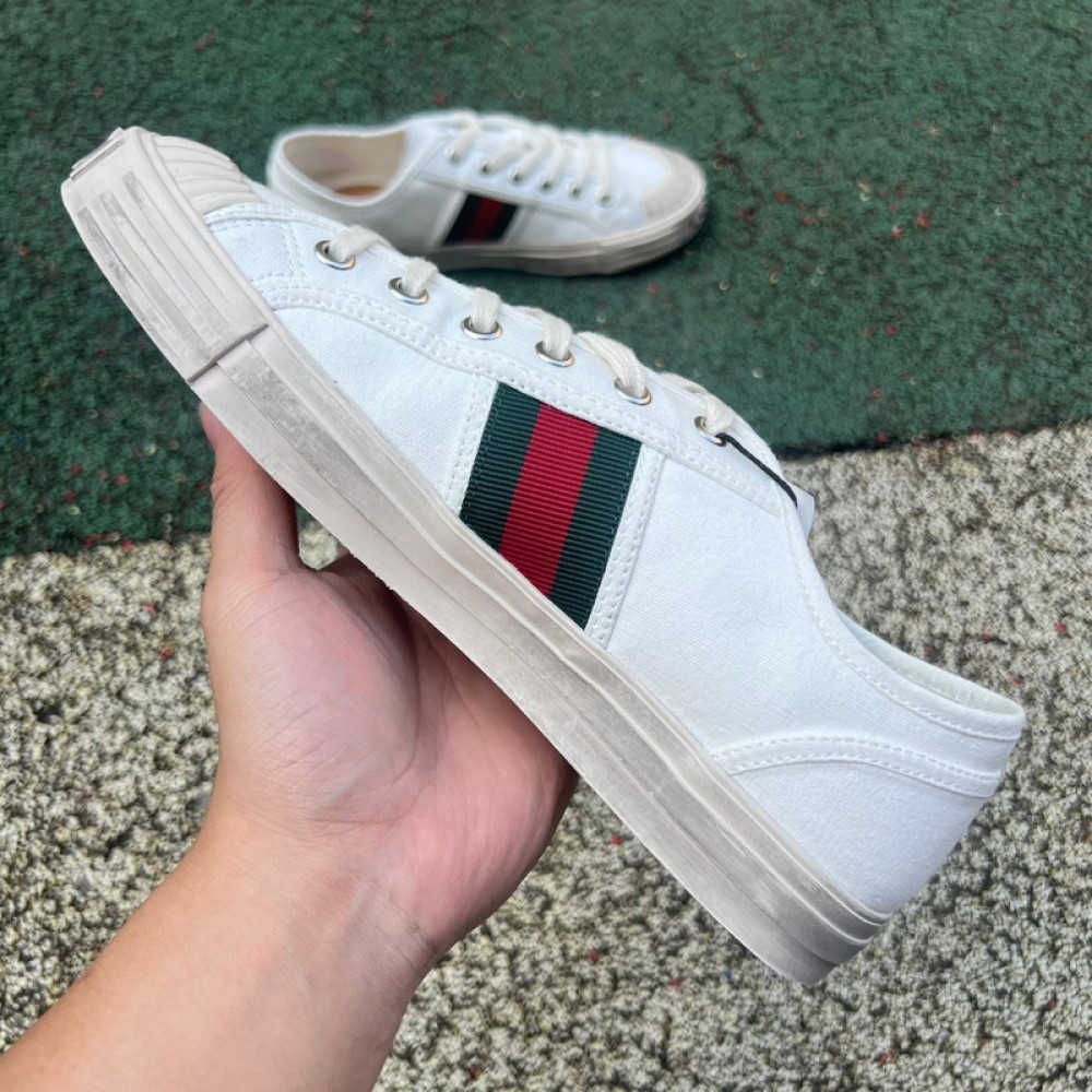 G*u*i1 sneakers