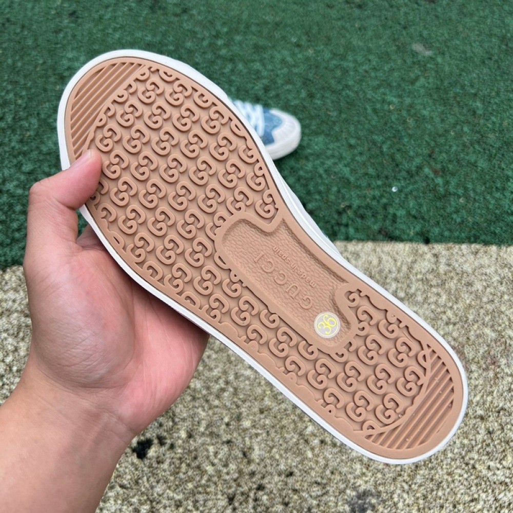 G*u*i1 sneakers