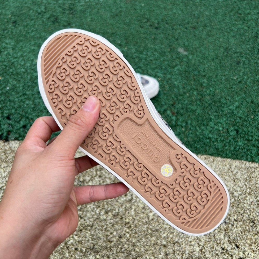 G*u*i1 sneakers