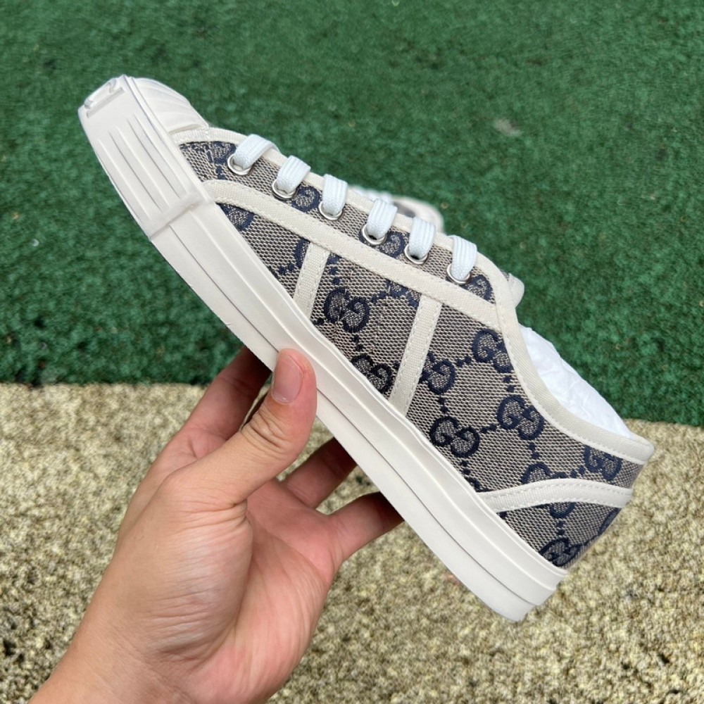 G*u*i1 sneakers