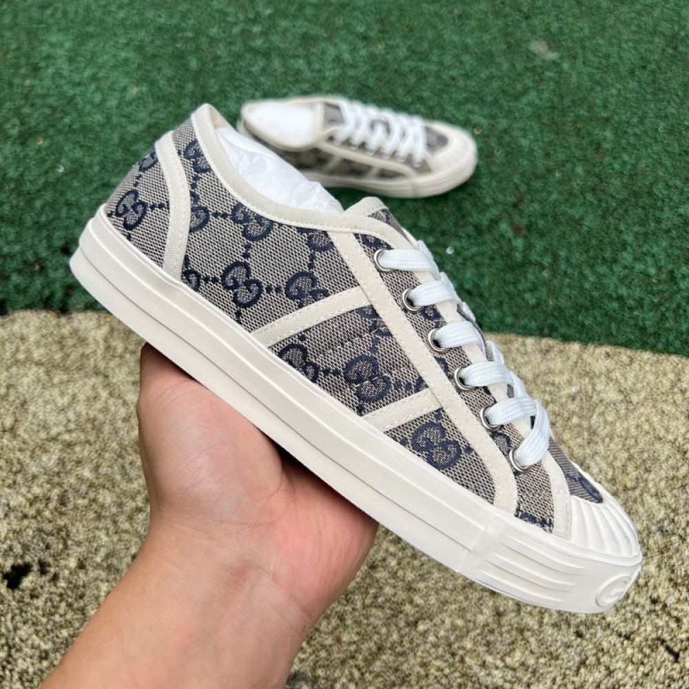 G*u*i1 sneakers