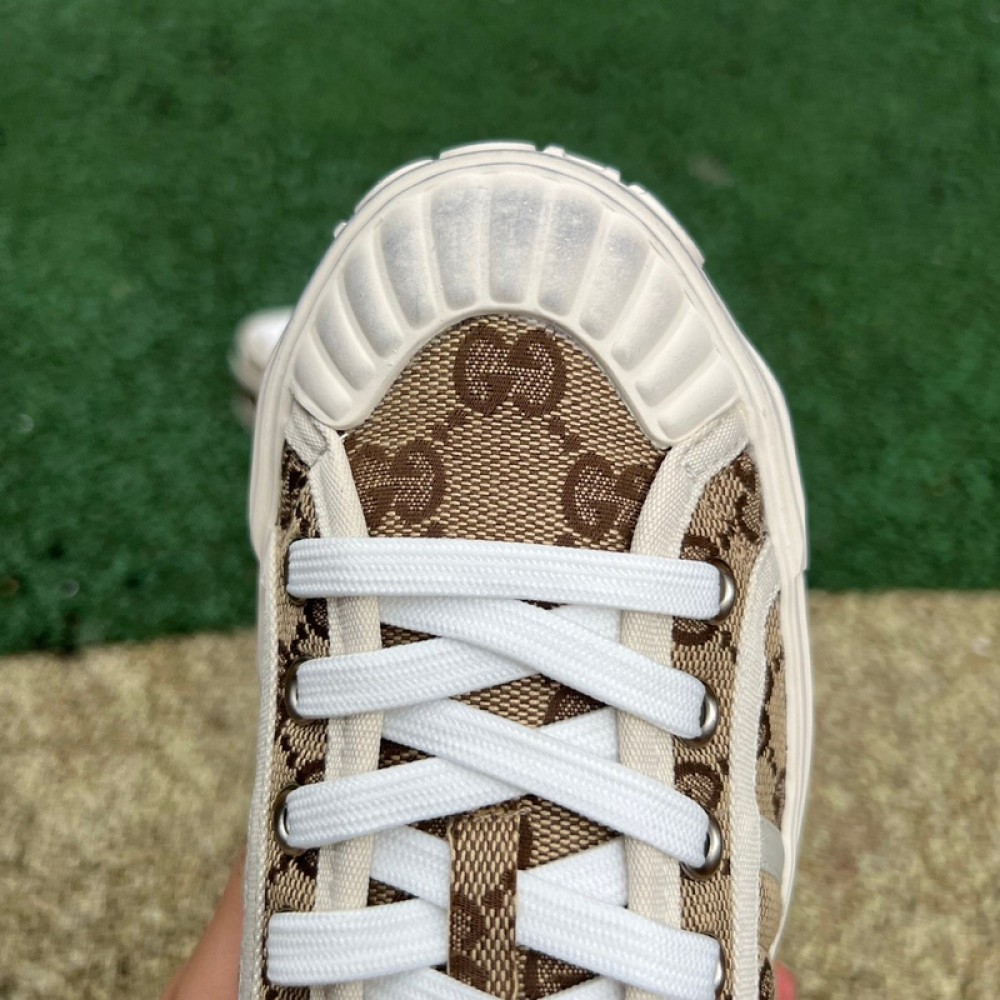 G*u*i1 sneakers