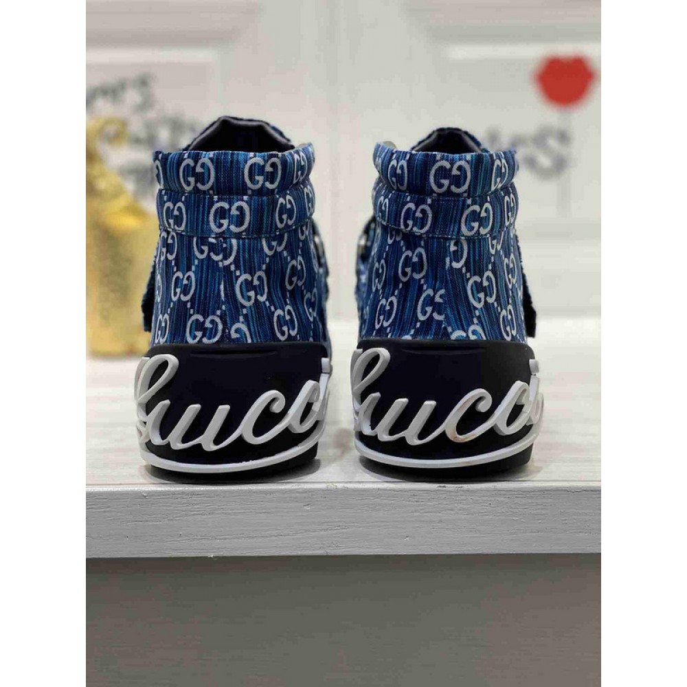 G*u*i1 sneakers