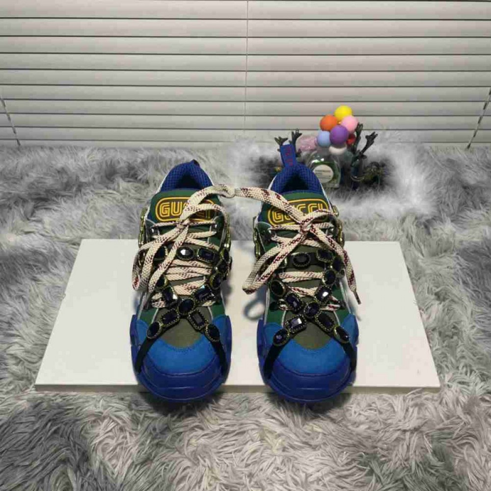 G*u*i1 sneakers
