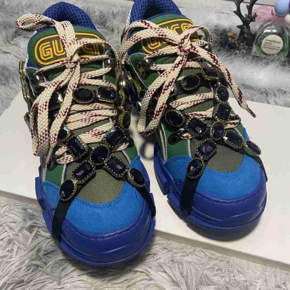 G*u*i1 sneakers