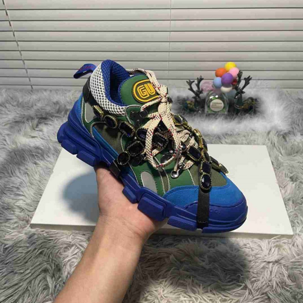 G*u*i1 sneakers