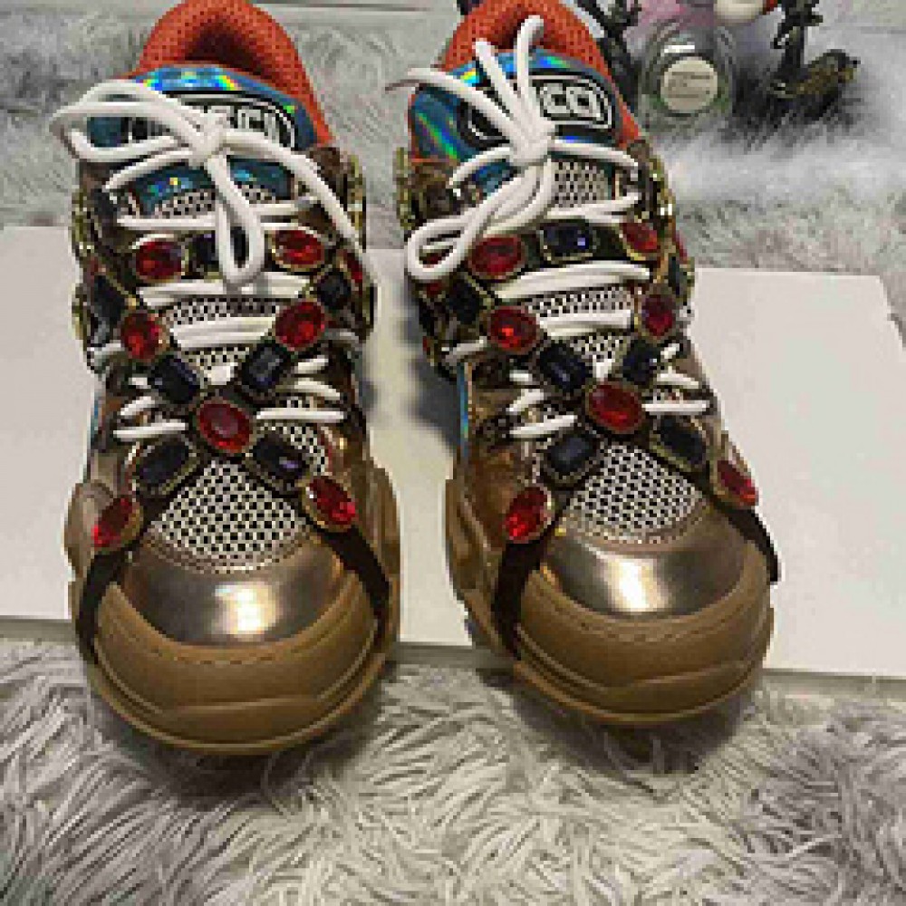 G*u*i1 sneakers