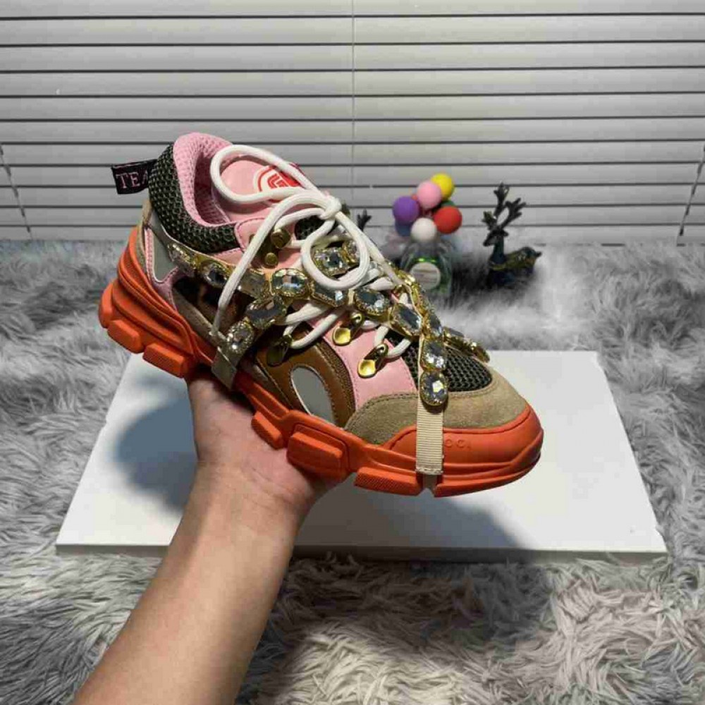 G*u*i1 sneakers