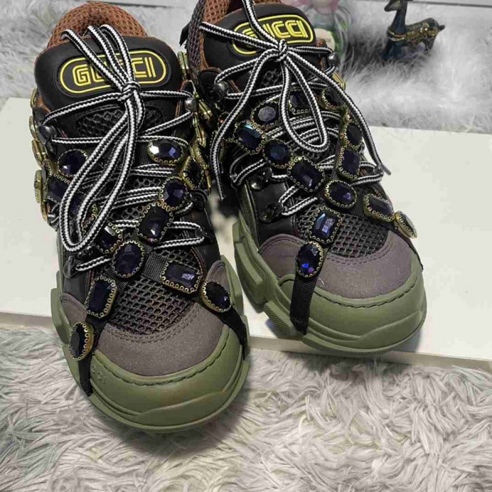 G*u*i1 sneakers