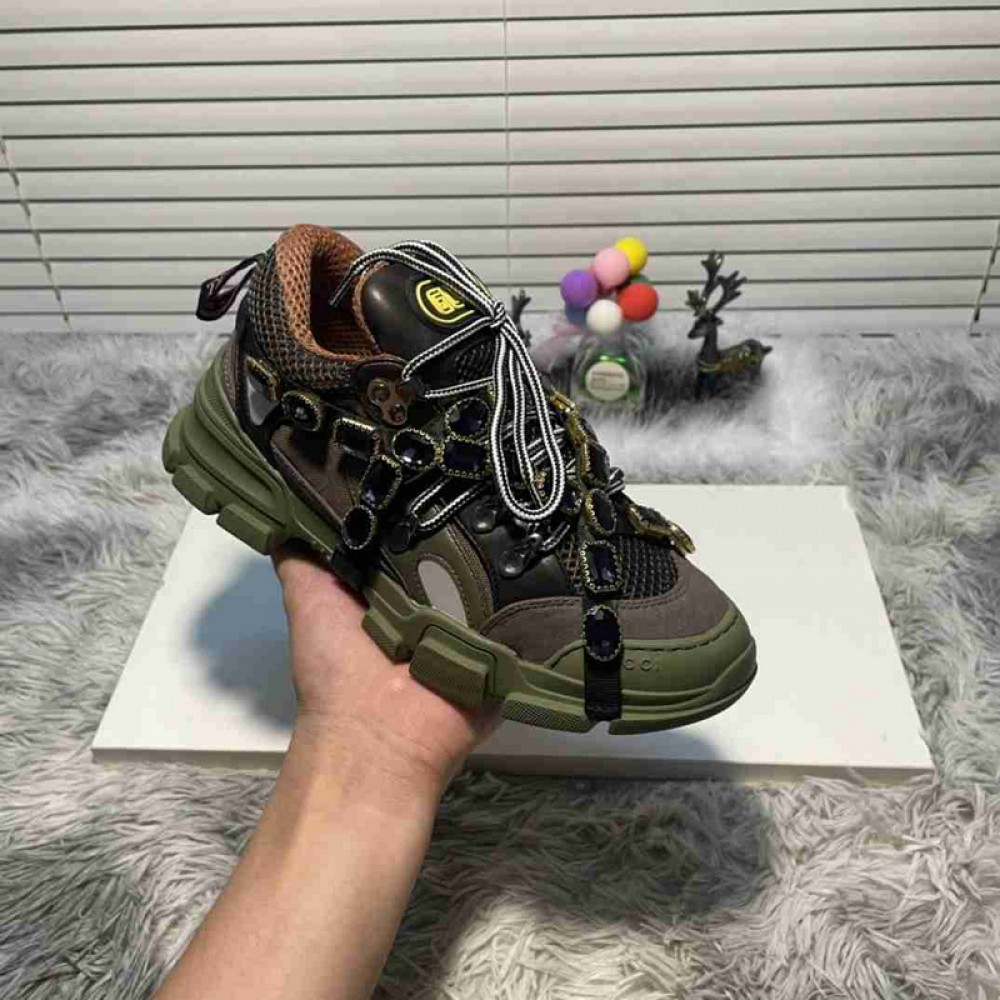 G*u*i1 sneakers