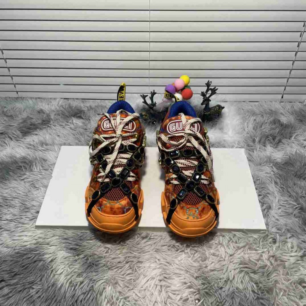 G*u*i1 sneakers