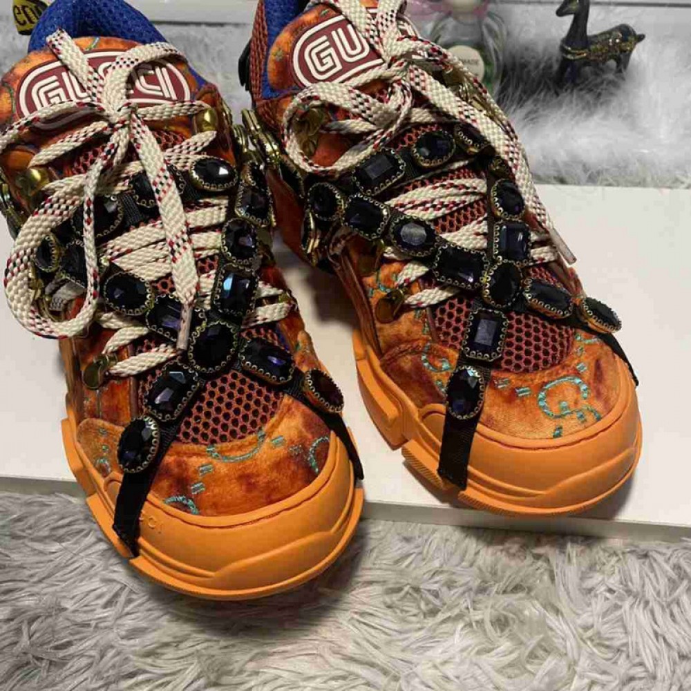 G*u*i1 sneakers