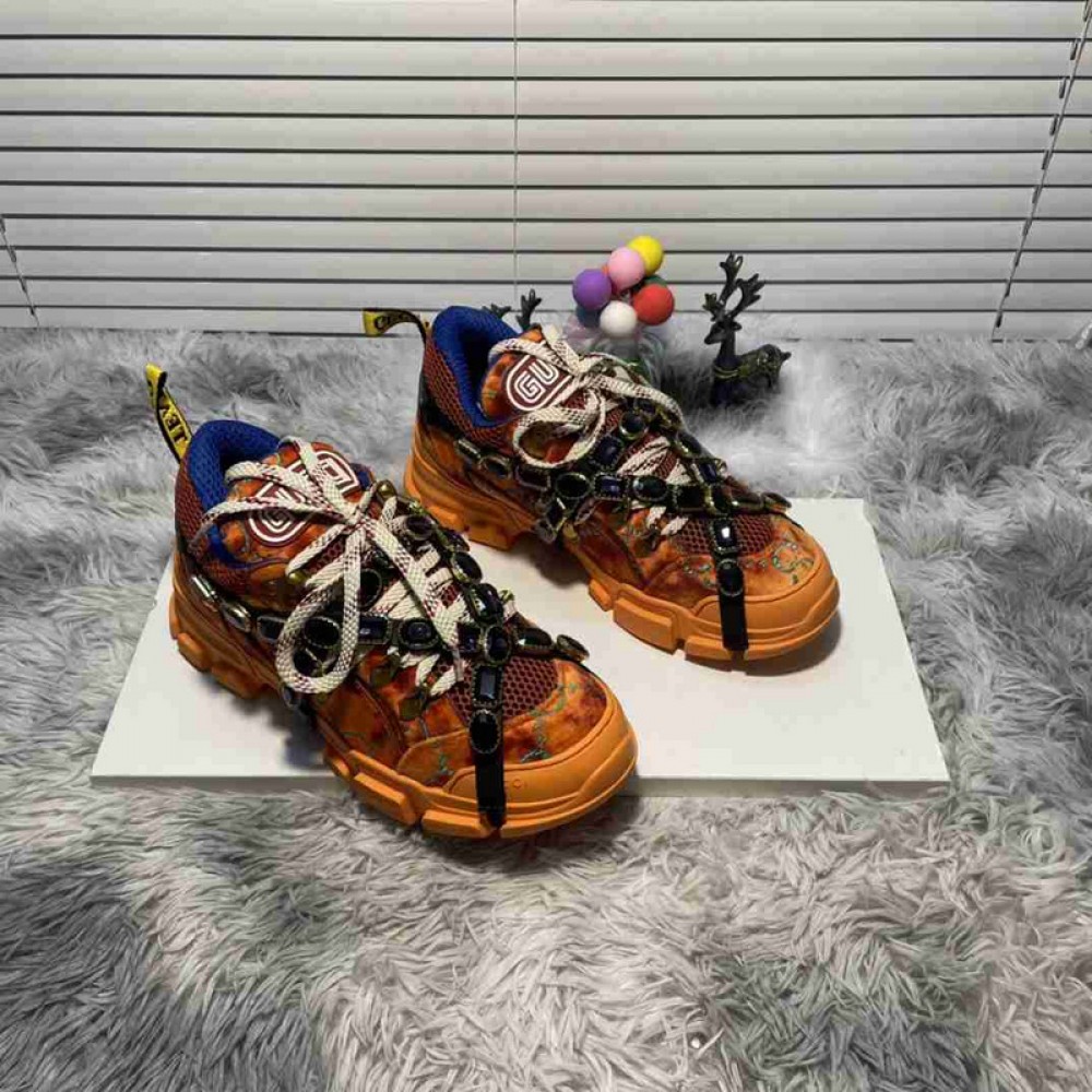 G*u*i1 sneakers