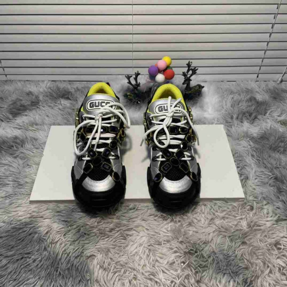 G*u*i1 sneakers