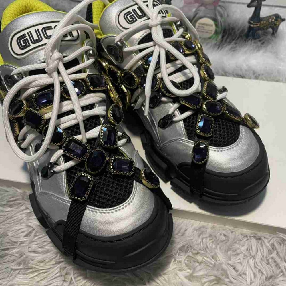 G*u*i1 sneakers