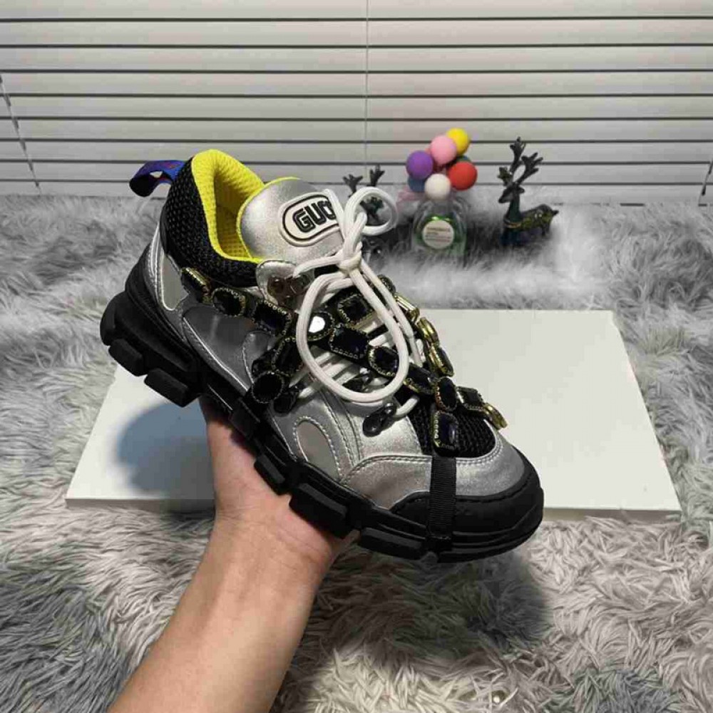 G*u*i1 sneakers