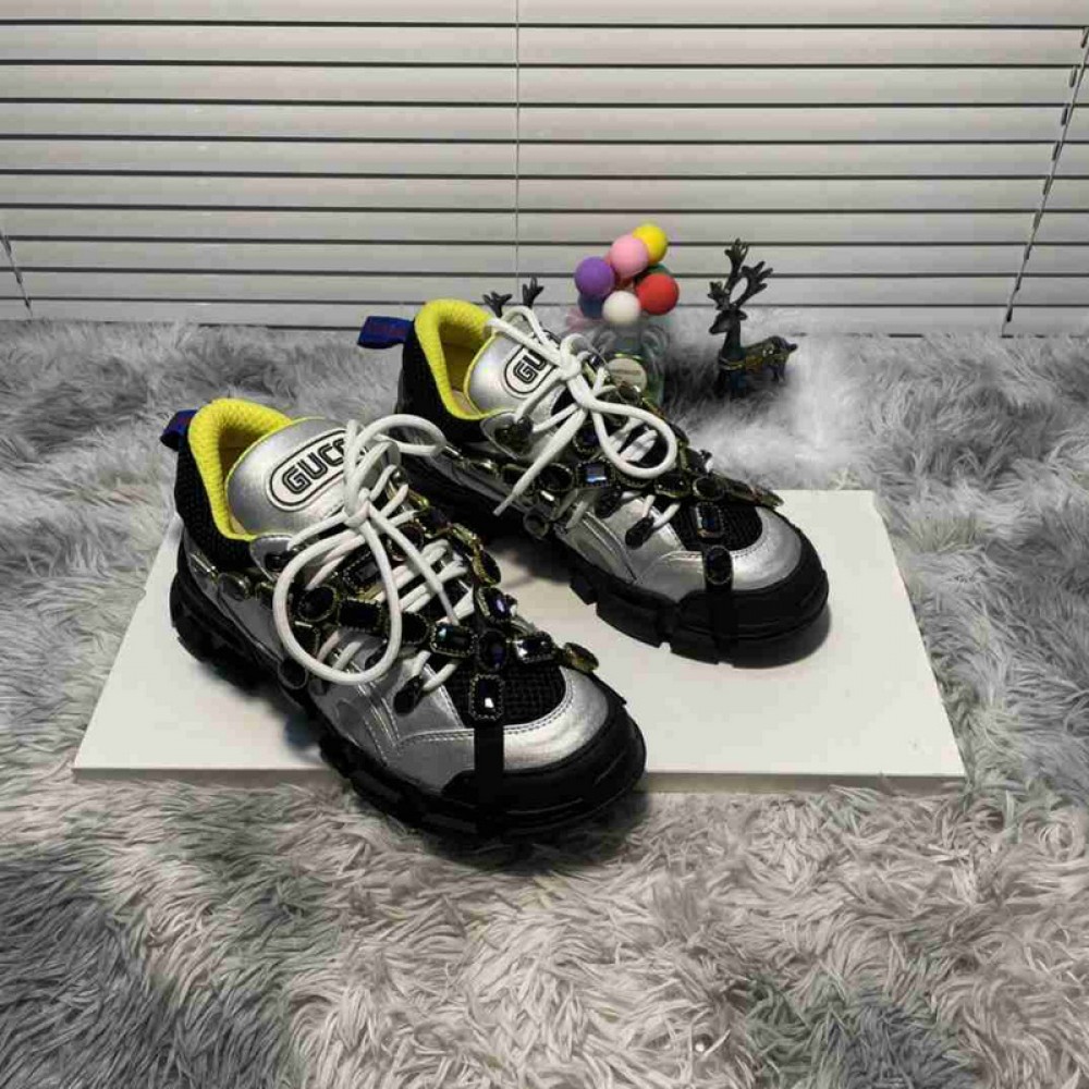 G*u*i1 sneakers