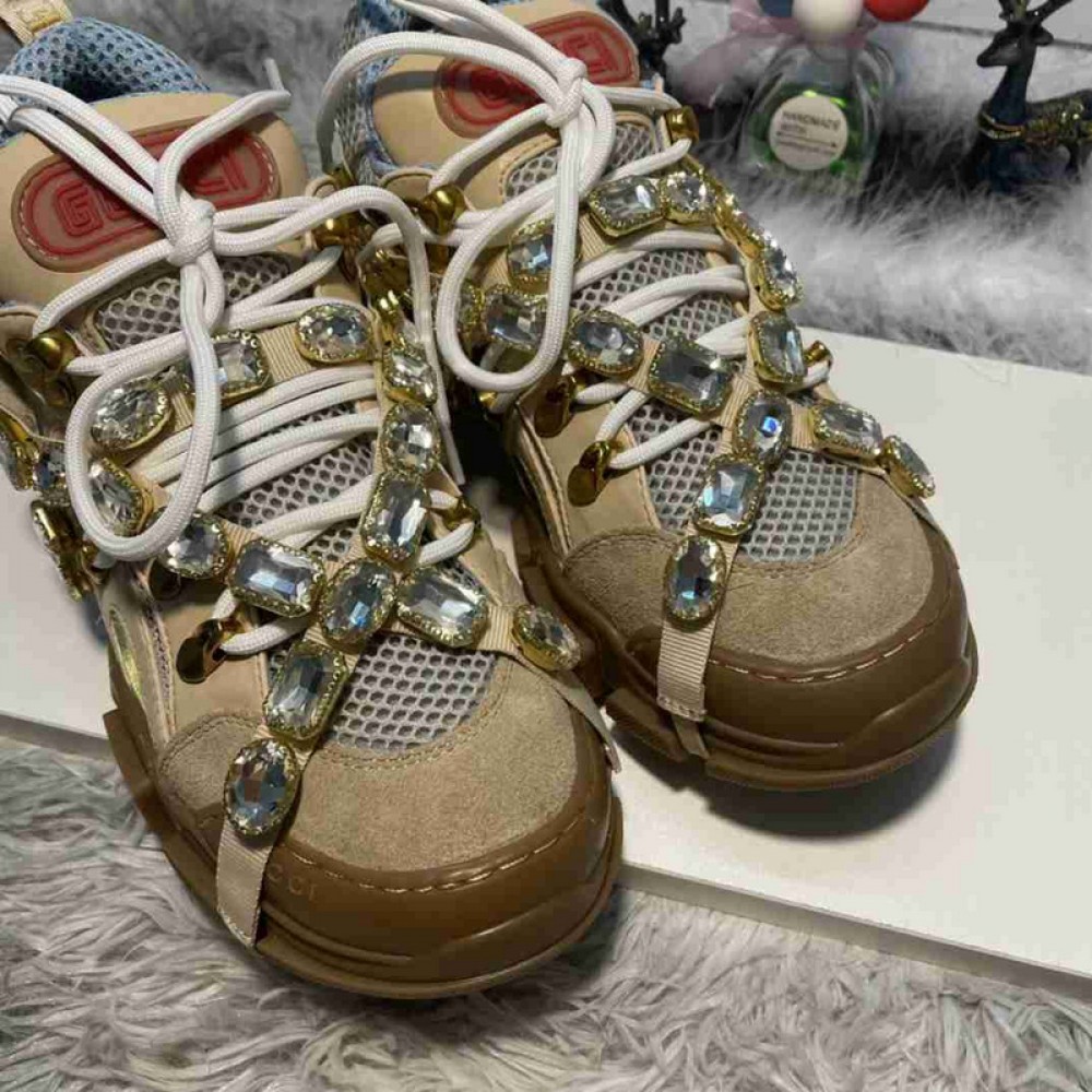 G*u*i1 sneakers