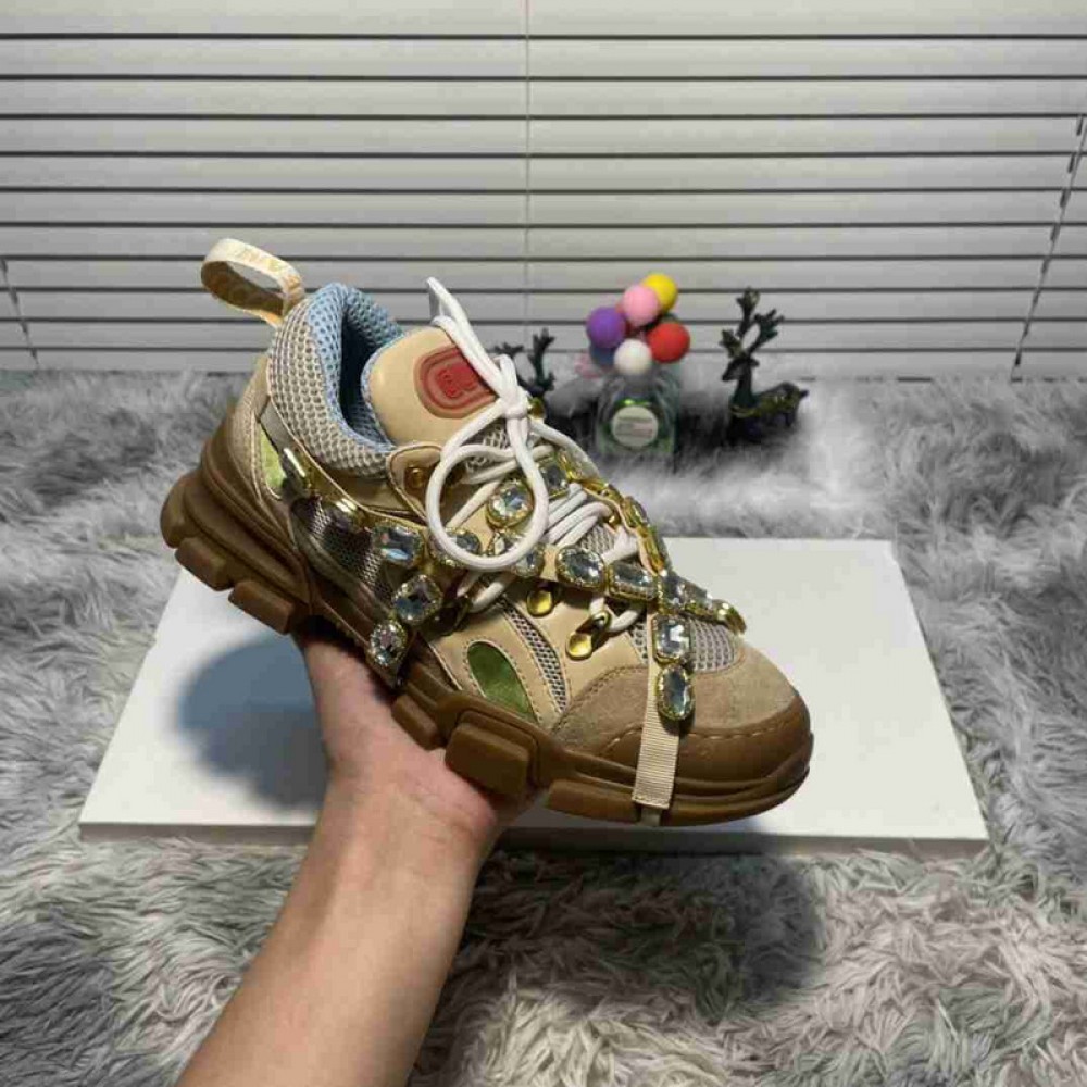 G*u*i1 sneakers