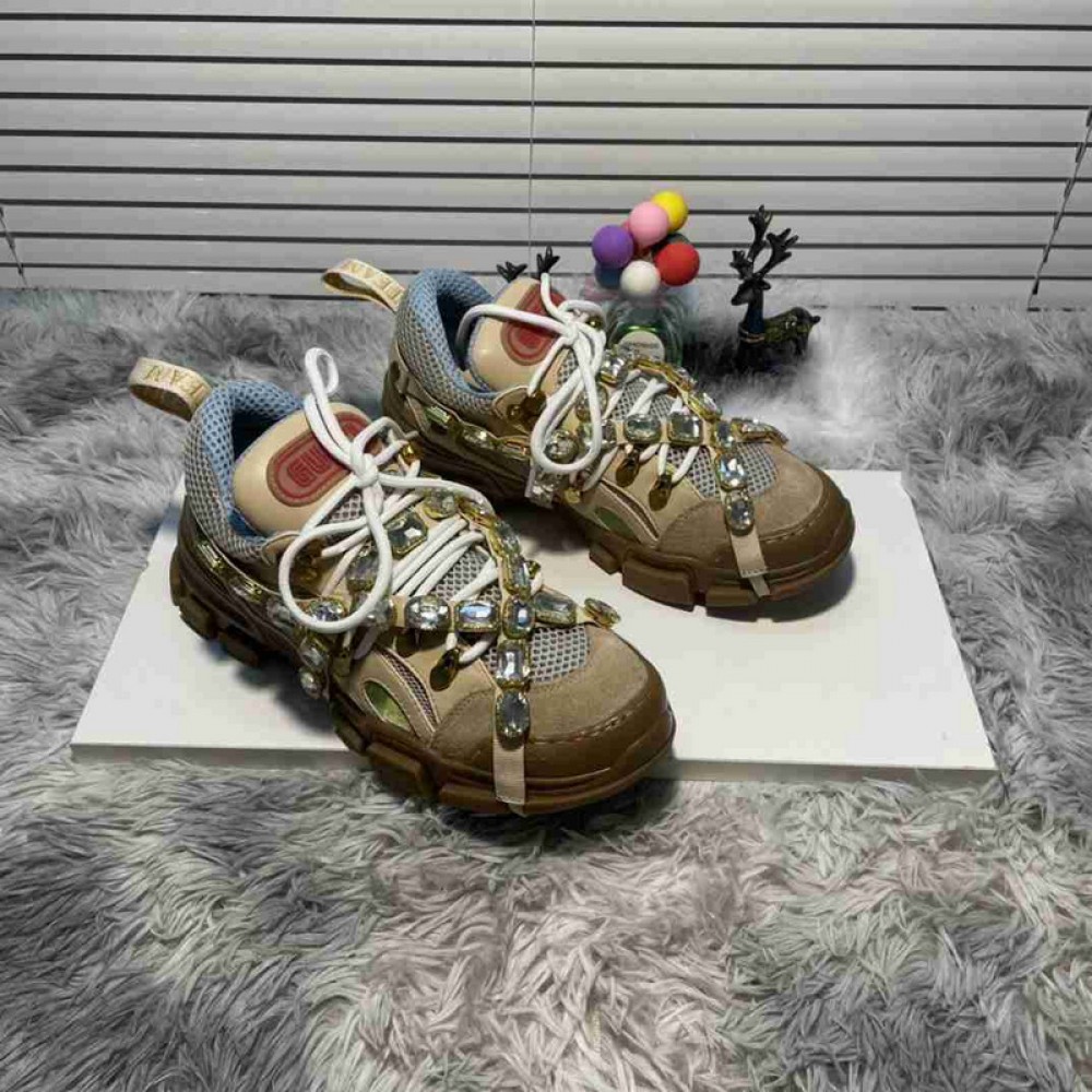 G*u*i1 sneakers