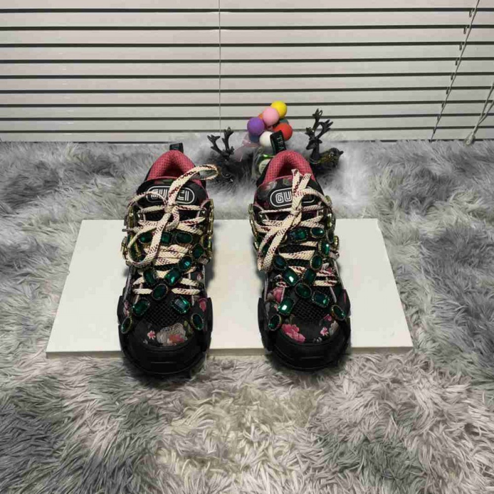 G*u*i1 sneakers
