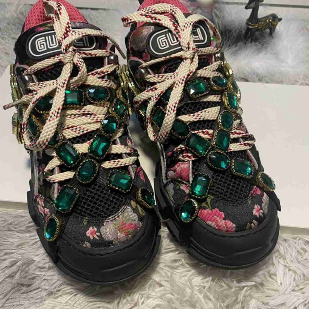 G*u*i1 sneakers