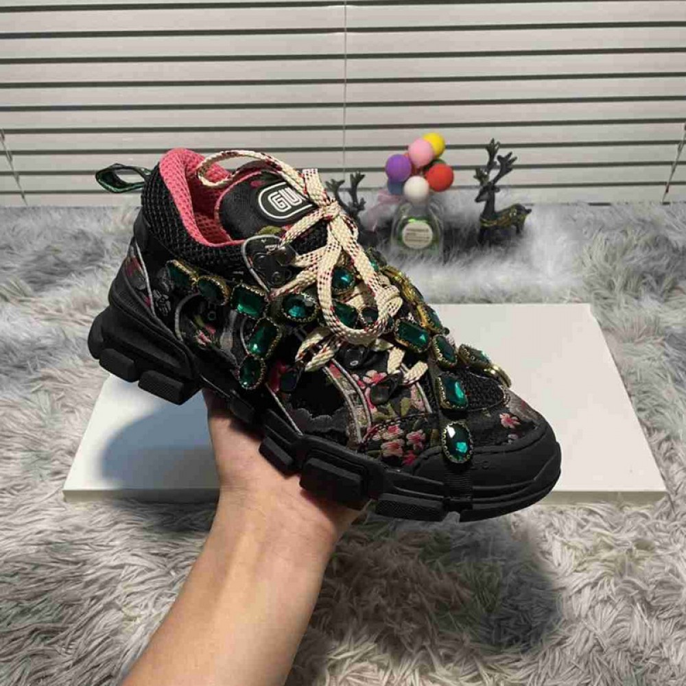 G*u*i1 sneakers