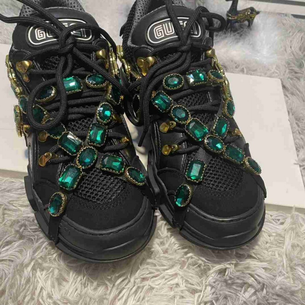 G*u*i1 sneakers