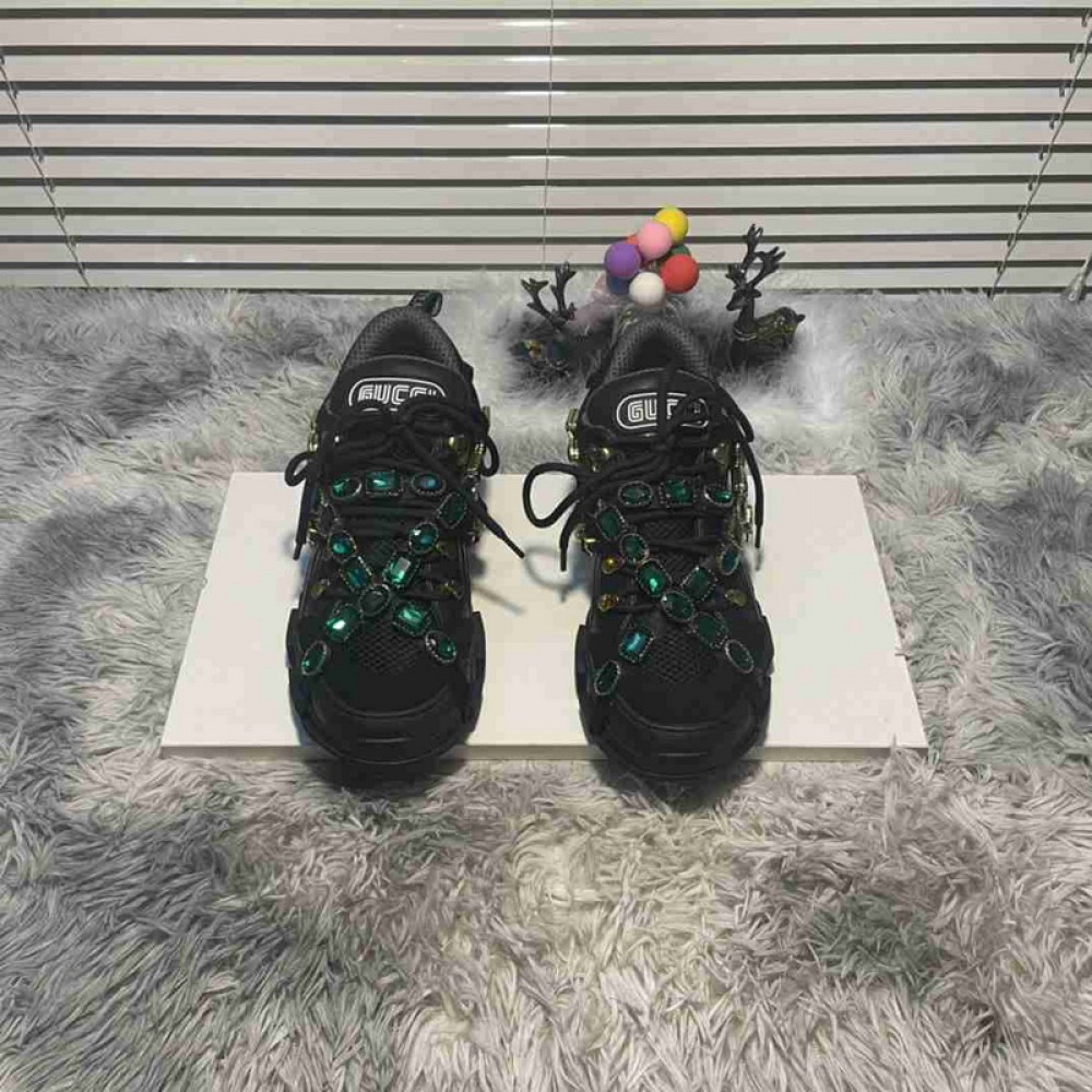 G*u*i1 sneakers