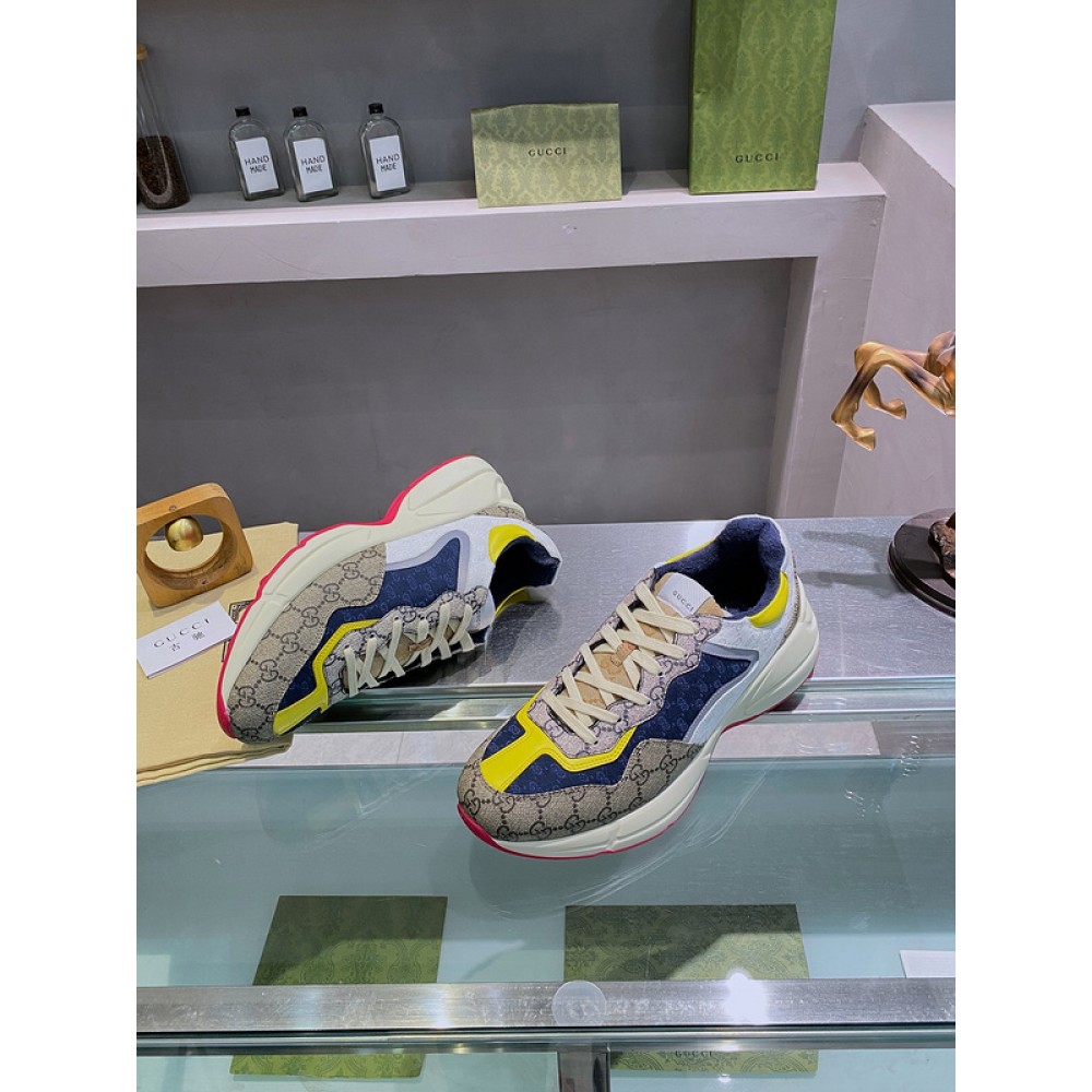 G*u*i1 sneakers