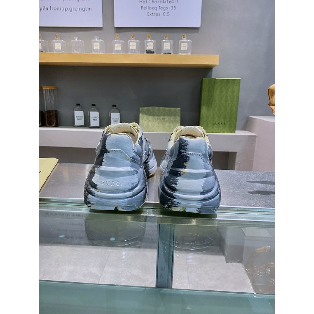 G*u*i1 sneakers