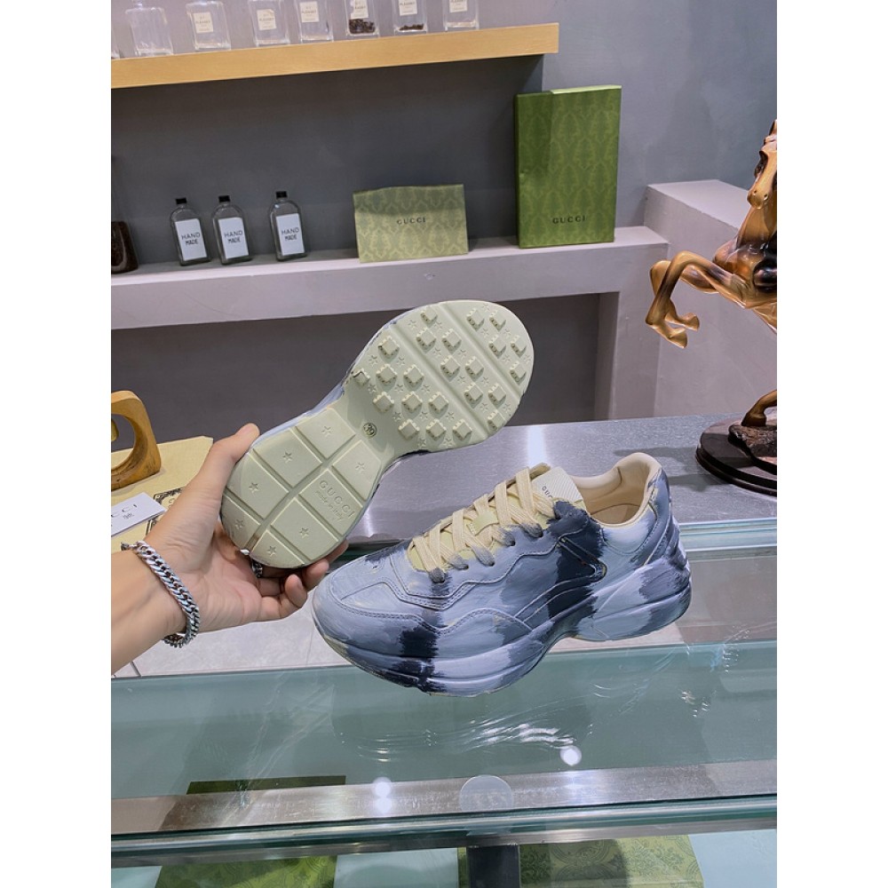 G*u*i1 sneakers