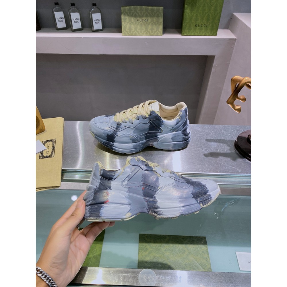 G*u*i1 sneakers