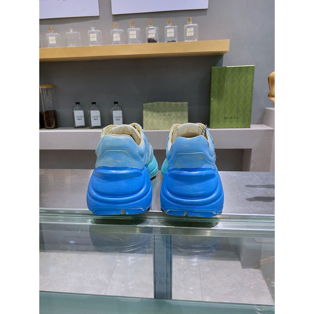 G*u*i1 sneakers