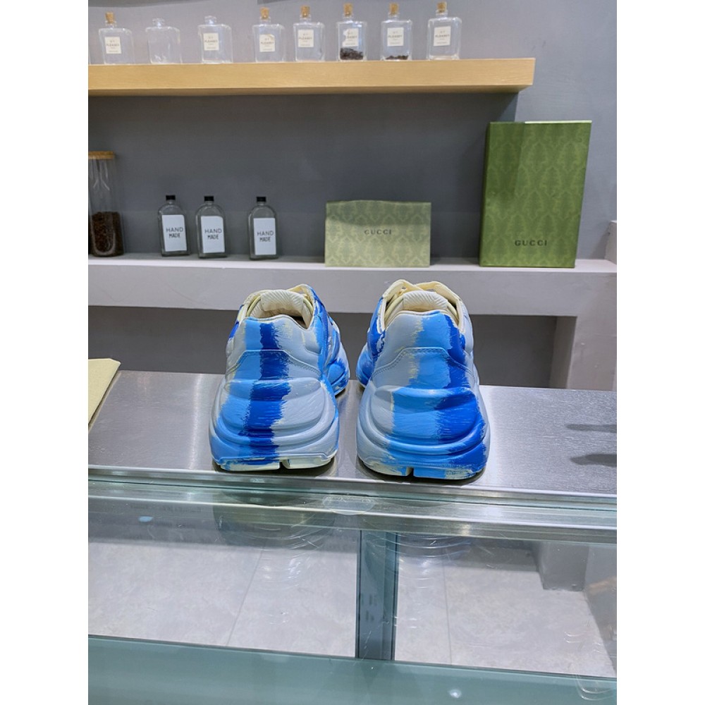 G*u*i1 sneakers