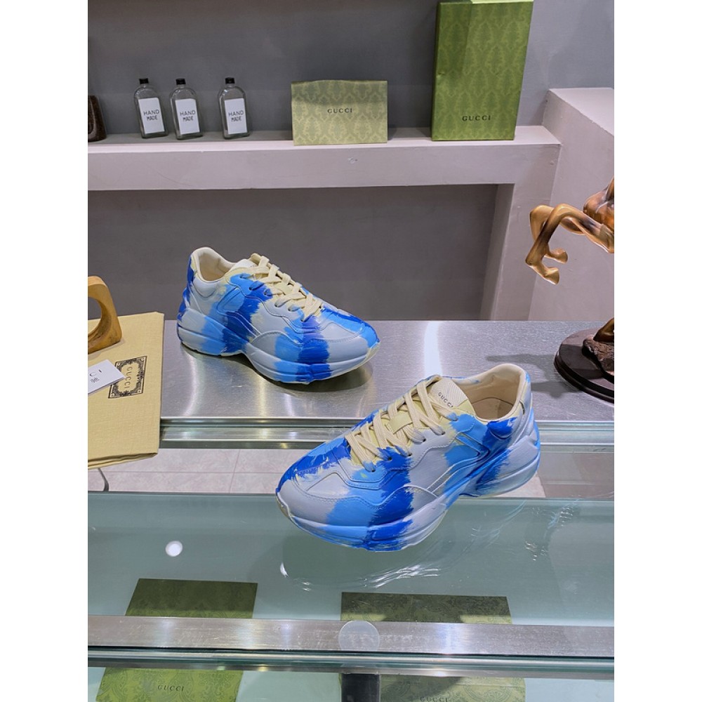 G*u*i1 sneakers