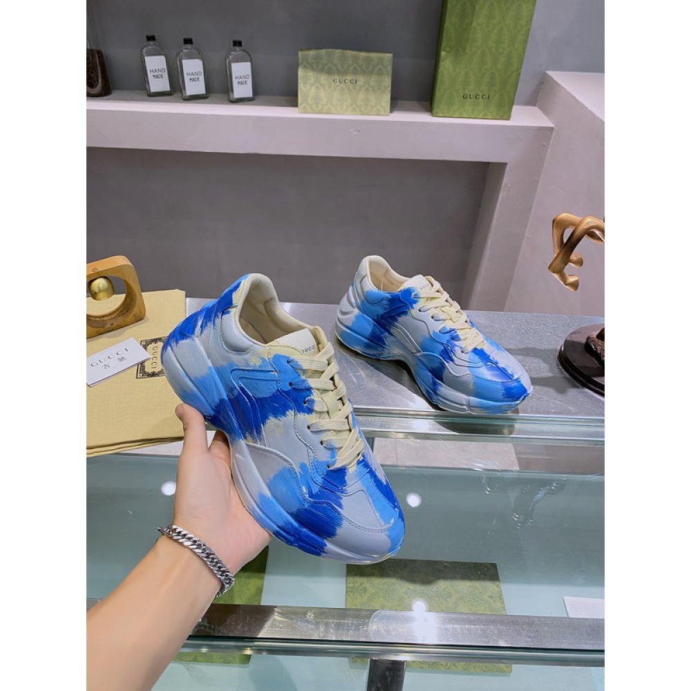 G*u*i1 sneakers