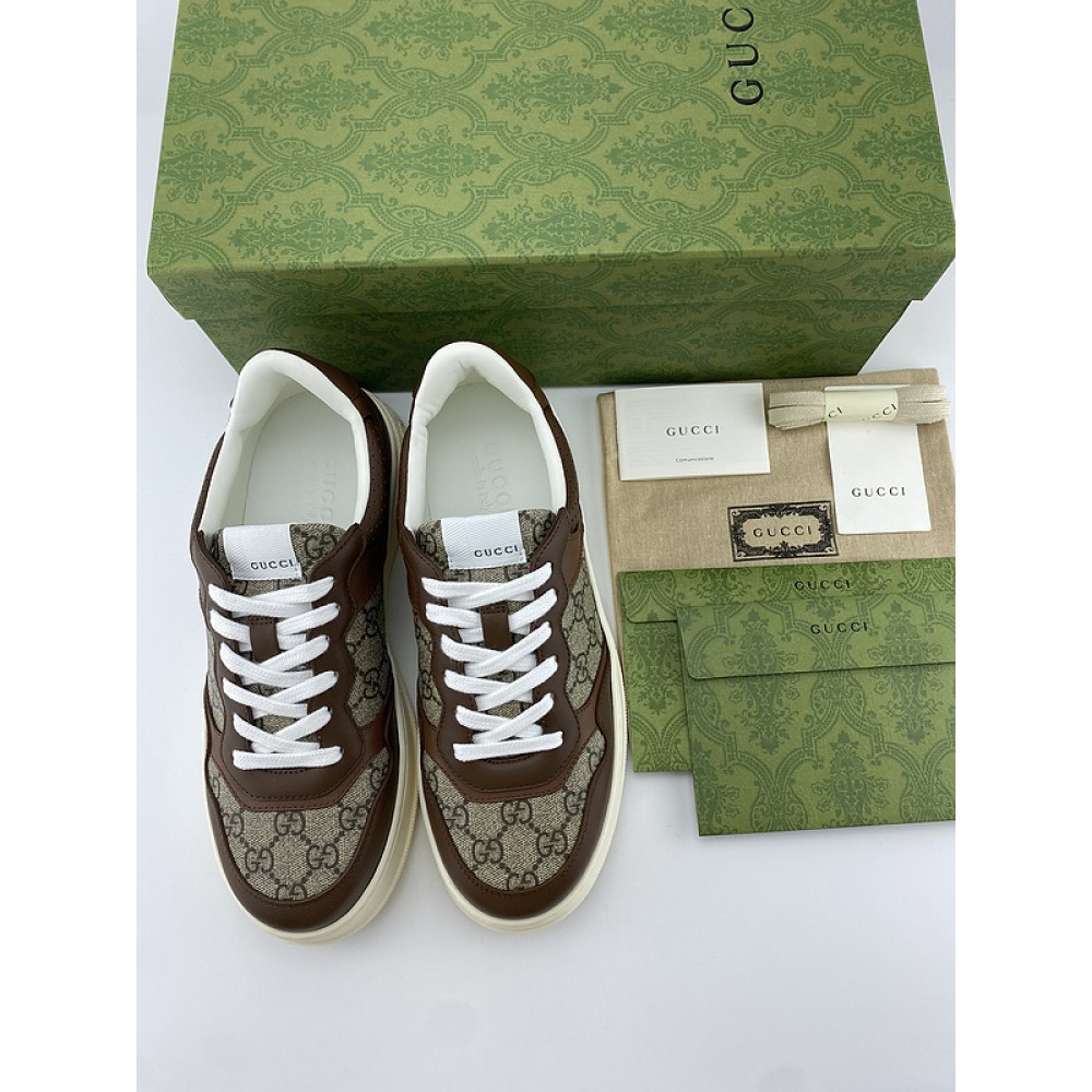 G*u*i1 sneakers