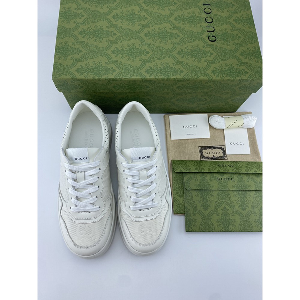 G*u*i1 sneakers