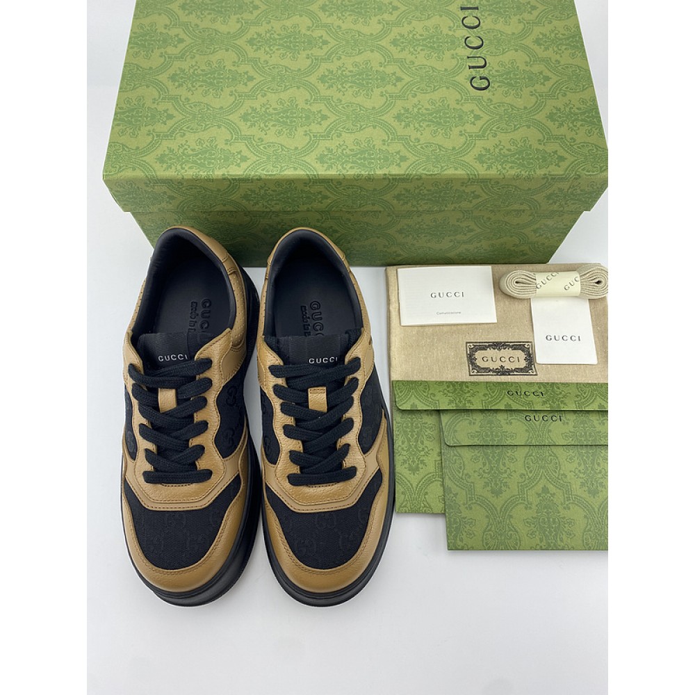 G*u*i1 sneakers