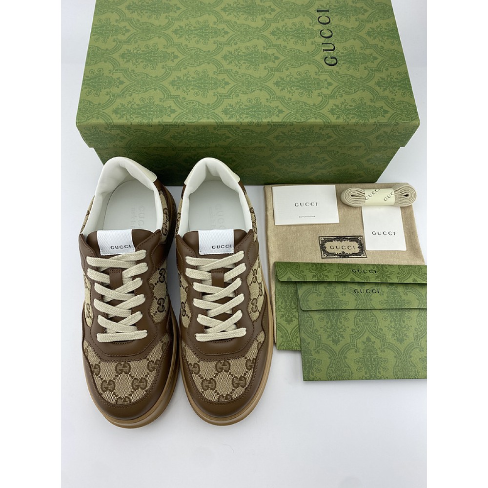 G*u*i1 sneakers
