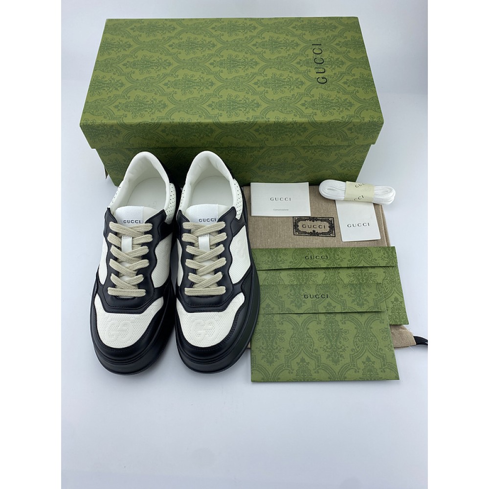 G*u*i1 sneakers
