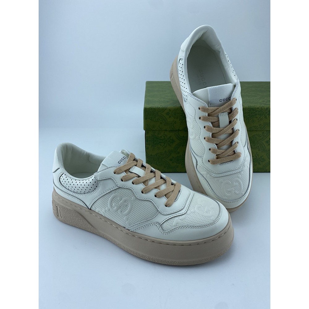 G*u*i1 sneakers