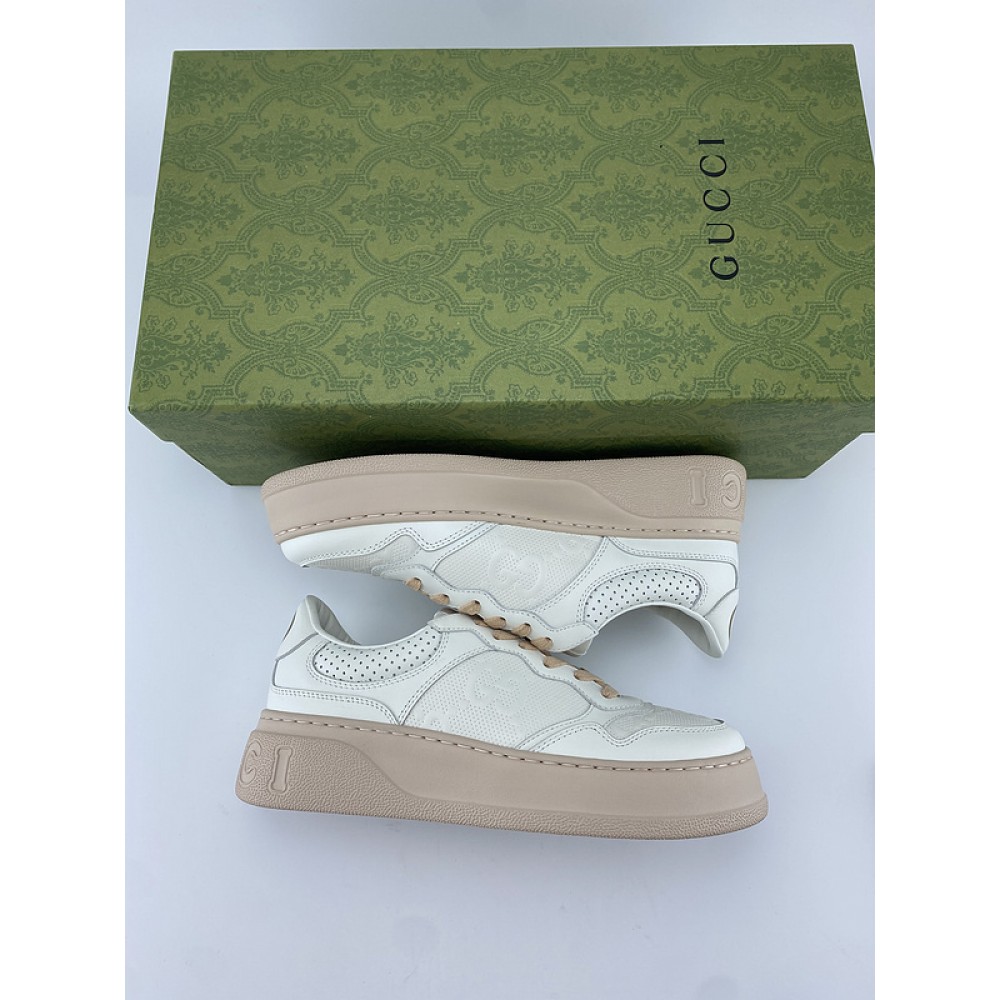 G*u*i1 sneakers