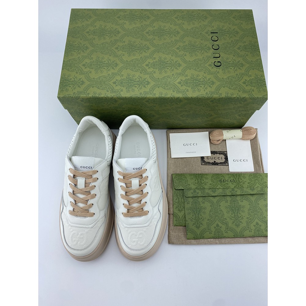 G*u*i1 sneakers