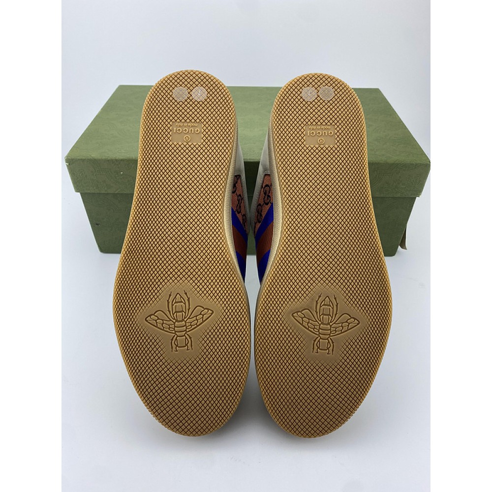 G*u*i1 sneakers