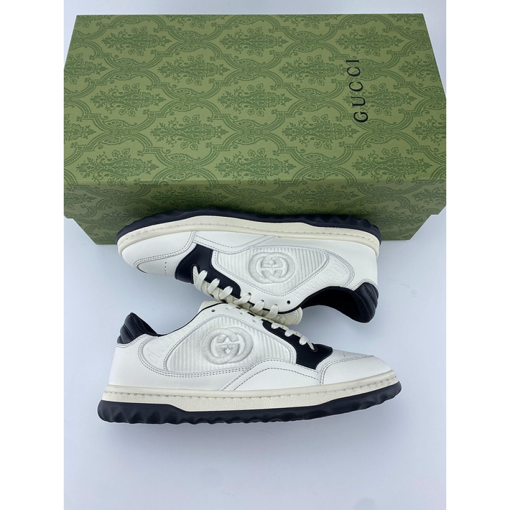 G*u*i1 sneakers