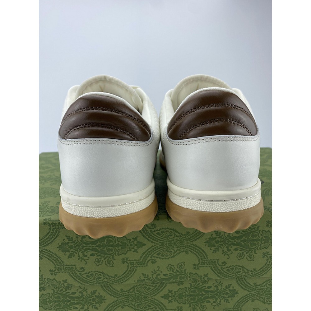 G*u*i1 sneakers