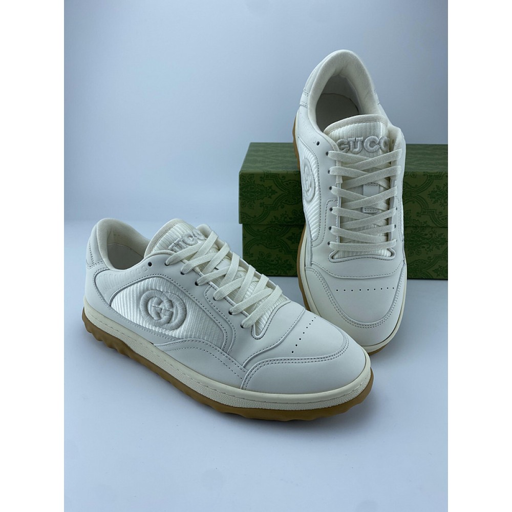 G*u*i1 sneakers